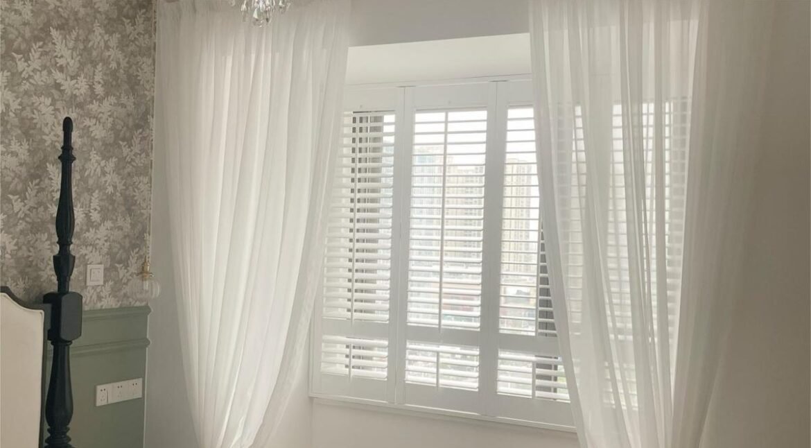 Pair Plantation Shutters with Curtains