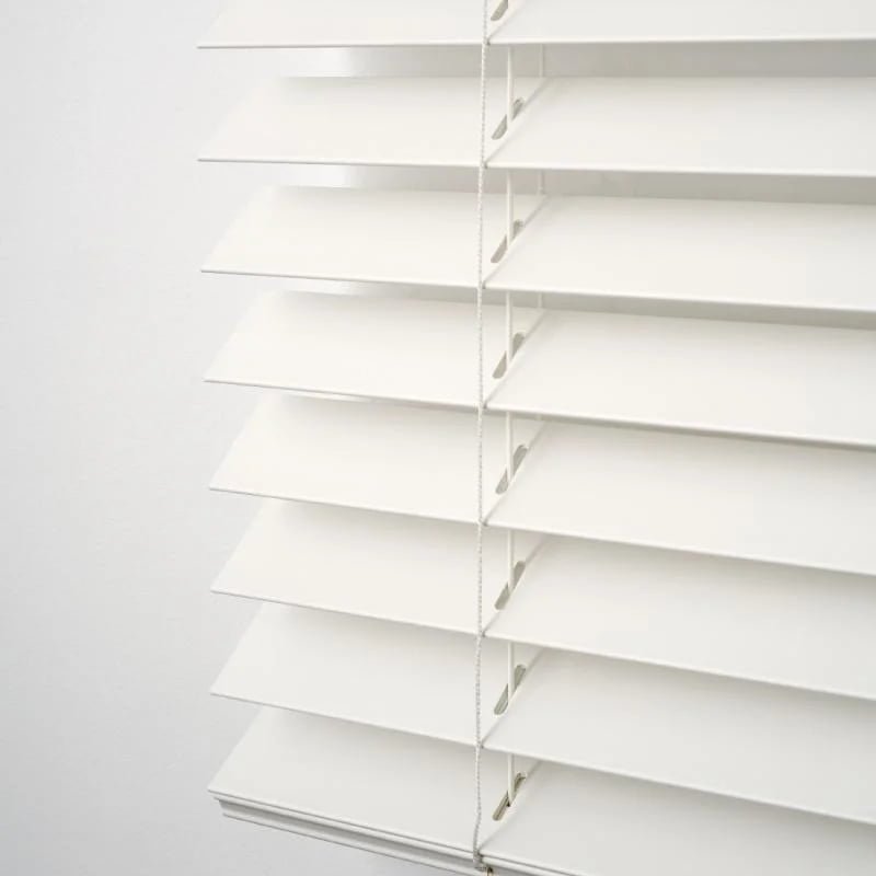25mm fine-profile PVC venetian blind installed on a residential window