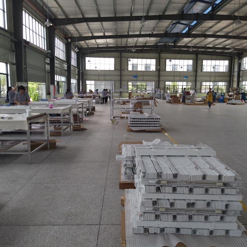 Goodwood Shutters factory floor showing automated CNC production of wholesale window blinds