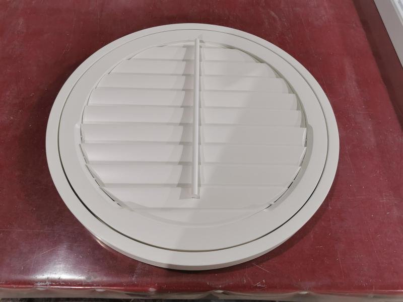 Circular porthole plantation shutter
