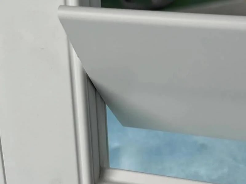 Close-up of aluminium shutter gear tilt rod mechanism