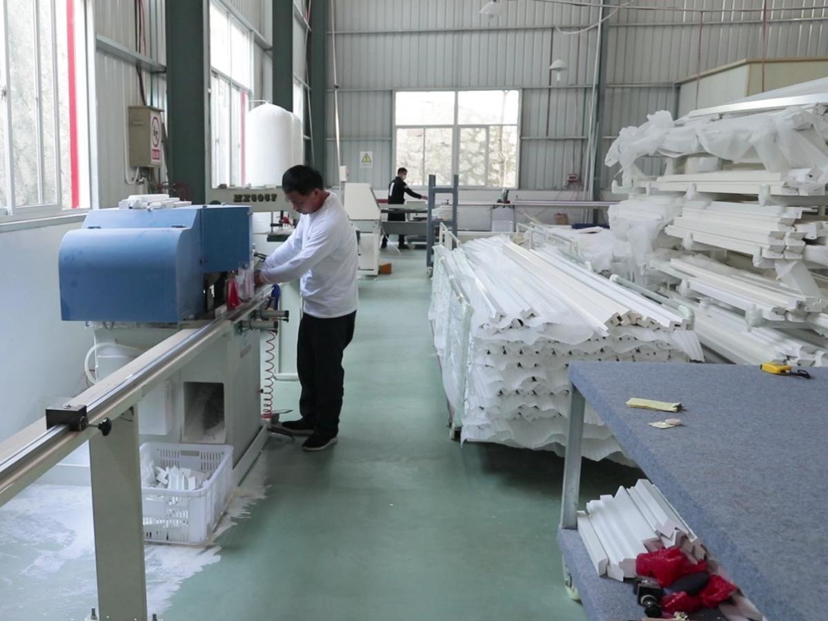 Goodwood Shutters assembly and finishing area -- automated workstations