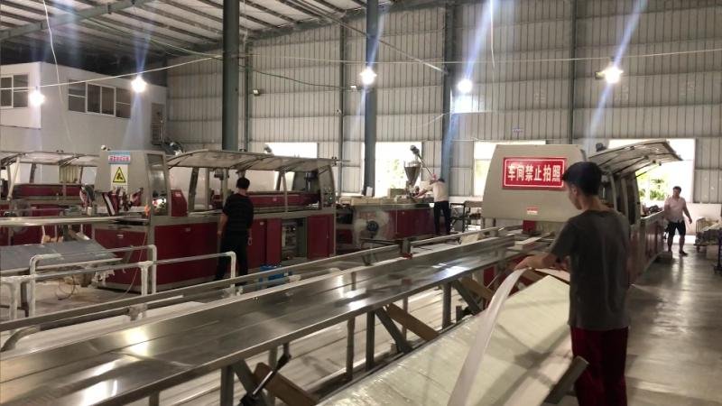 PVC extrusion production line inside a manufacturing facility