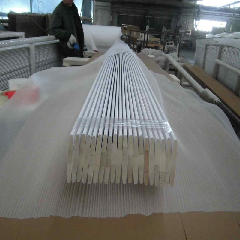 Machined wood louvres and shutter stiles on CNC workbench -- wood shutter parts manufacturer