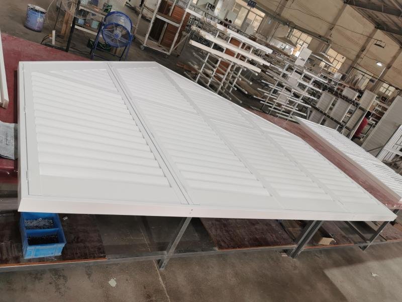 Triangular raked plantation shutter panels on a gable window