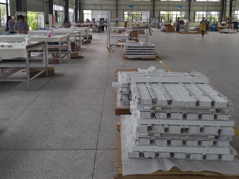 Shipping containers at port with building material cargo